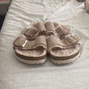 Off-White colored fuzzy birks